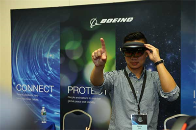 GGCS 2017 student attendees participated in a networking event with representatives from Summit sponsors, including Lockheed Martin, Boeing, Northrop Grumman, and Shell, featuring a resume station, Bingo game, aviation simulators, and virtual & augmented reality gadgets, and ice breaker activities.